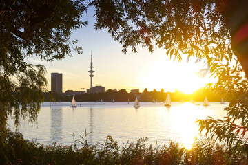 Outer Alster lake Außenalster in Hamburg, Germany, during sunset on a warm and beautiful summer...