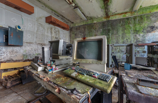 Old computers from the 80s in an abandoned computing center