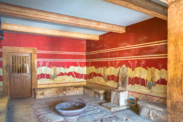 The hall of throne, at the palace of Knossos, famous ancient city in Crete, located near modern Heraklion city