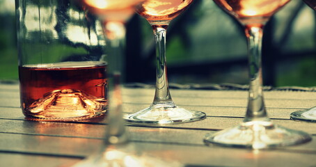 Composition with rose wine glasses , dark backgound