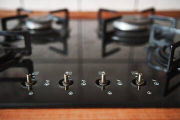 Fototapeta na wymiar Control panel of gas stove oven. Removed knobs during cleaning. Kitchen equipment during service.