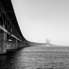 black and white view of the Oresund Bridge between Denmark and Sweden