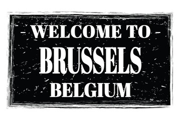 WELCOME TO BRUSSELS - BELGIUM, words written on black stamp