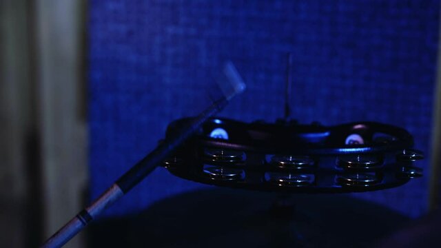 Drummer Playing Tambourine With Sticks