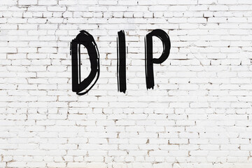 Inscription dip painted on white brick wall - obrazy, fototapety, plakaty