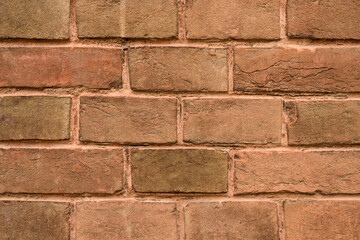 Texture of an old red brick wall. Grunge, abstract background texture with dirty old and vintage pattern. The wall of the old house.
