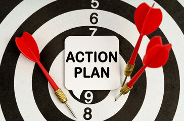 There is a sign on the target that says - ACTION PLAN