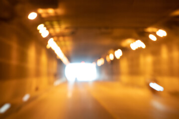 The car runs at speed in the tunnel. , saw the light at the end of the tunnel