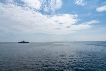 view of the Langeland Ferry crossing the open ocean from Langeland Island to Lolland Island in Denmark