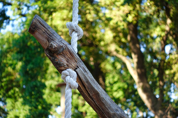 Log tied to rope at obstacle course 