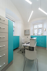 Eye clinic room. White hospital clinic office consulting room. Eye surgery, eye clinic.