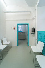 Eye clinic waiting room. White hospital clinic office waiting room. Eye surgery, eye clinic anteroom.