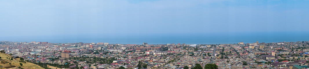 Fototapeta na wymiar panorama of the city of Derbent with the caspian sea coast from the height of the fortress
