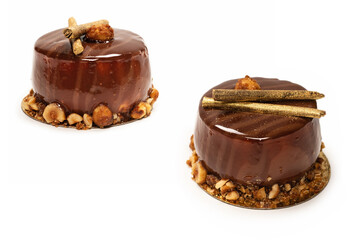 Chocolate and caramel cake isolated on a white background.