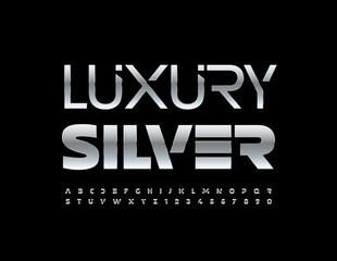 Obraz premium Vector Luxury Silver Alphabet set. Metallic techno Font. Futuristic modern Letters and Numbers