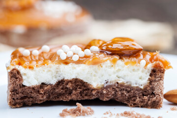 tartlet with milk cheese filling and lots of salted caramel with nuts