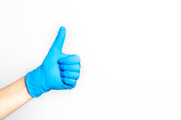 show hand gesture - thumb up close up on white background