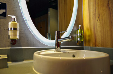 Turkish bath or steam sauna relaxation room loungers inside male locker room of spa or wellness...