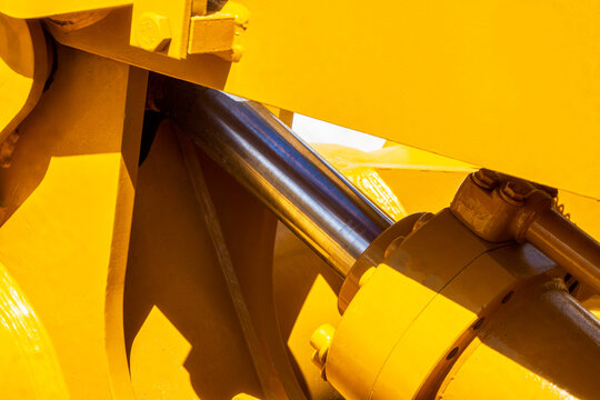 Hydraulic piston system for bulldozers, tractors, excavators, chrome plated cylinder shaft of yellow machine, construction heavy industry detail