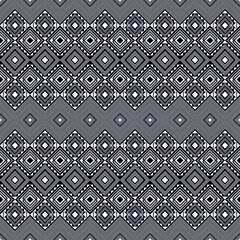 Seamless Geometric Tribal Pattern in Gray Tones