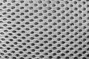 Close-up texture photo of grey colored spacer mesh material pattern. - obrazy, fototapety, plakaty