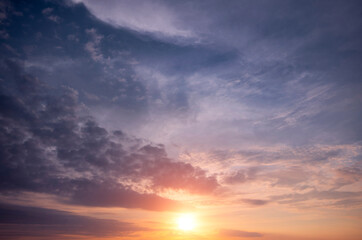 Naklejka na ściany i meble Dramatic sky at sunset on a summer day.