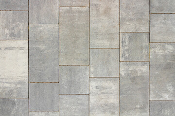 Texture photo of grey colored concrete pavement road tile texture.
