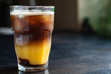 coffee orange juice bumble bee cocktail on the table, healthy food meal snack copy space food...