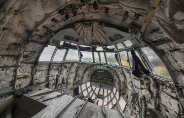 Severely damaged cockpit of an abandoned cargo plane