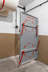 Open iron door to a Russian bomb shelter