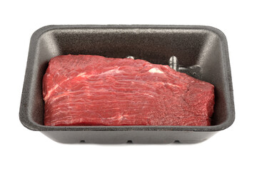 Raw beef in a tray isolated on white background.