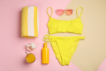 Flat lay composition with beach objects on color background