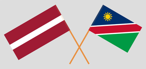 Crossed flags of Latvia and Namibia. Official colors. Correct proportion