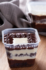 Chocolate cake in the pot for delivery.  Copy space.