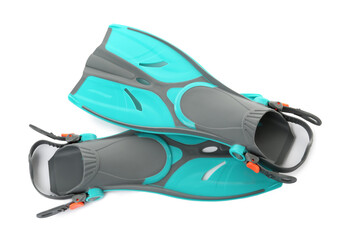 Pair of turquoise flippers on white background, top view © New Africa
