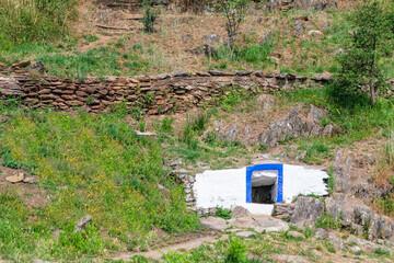 A spring in a mountainous area on a mountainside