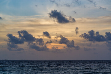 the sandy coast of a coral island in the Indian Ocean