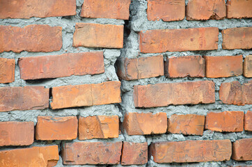 red brick wall texture grunge background with vignetted corners