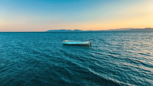 boat at sunset in Ayvalik, Turkey