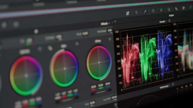 Color correction post production video grading close up 4k. Monitor view of working process broadcast or photo editing. Color wheels and scopes show working process

