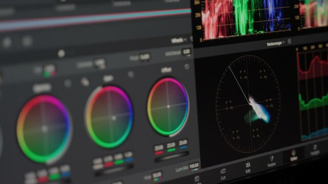 4k Video or photo grade using color wheels rings. Color grading correction process in software professional program. Monitor view of working process broadcast. Scopes and vetroscope can be seen