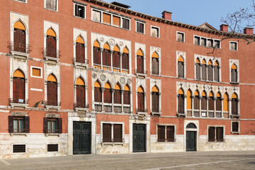 Fototapeta na wymiar Traditional Venetian buildings on Campo San Polo square in Venice, Italy