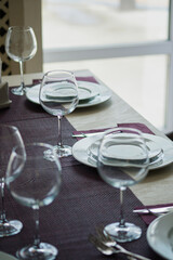 Table setting in the restaurant. Preparing the restaurant for the opening.
