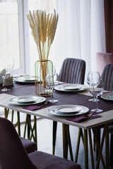 Table setting in the restaurant. Preparing the restaurant for receiving guests.