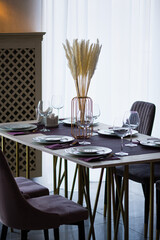 Table setting in the restaurant. Preparing the restaurant for receiving guests.