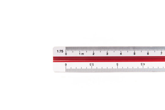 Scale ruler close up, tool for precise measuring and to change scales, also called escal&iacute;metro used by engineers and architects isolated on white