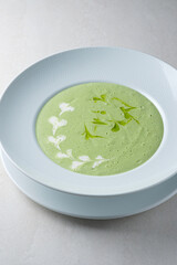 Menu for the restaurant: broccoli cream soup, seasoned with olive oil and cream.