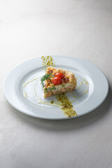 Menu for the restaurant: quiche with salmon.
