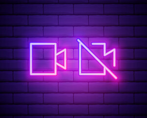 Glowing neon line Photo camera icon isolated on brick wall background. Foto camera icon. Vector Illustration