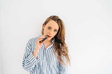 beautiful careless female with makeup looking at camera